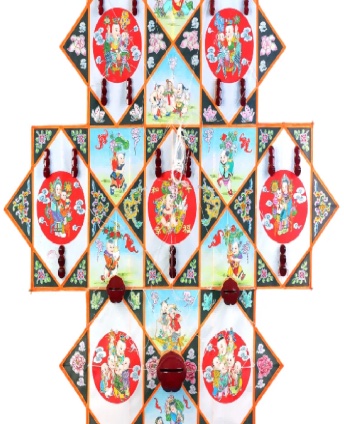 A Nantong banyao board kite — hexagonal panels painted with folk figures and fitted with sounding whistles