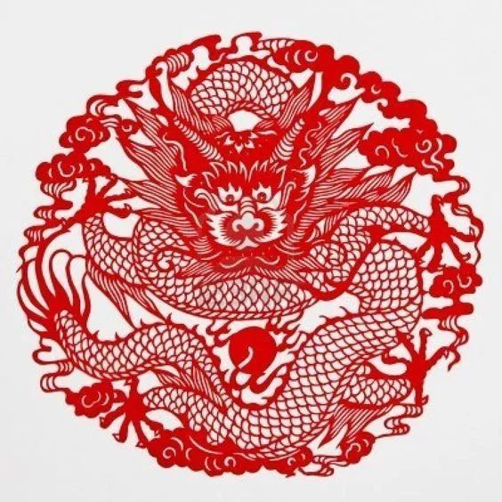 A circular dragon paper cut, an auspicious motif in Chinese folk art